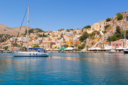 The beautiful island of Symi with a turquoise bay and colorful architecture Dodecanese, Greece