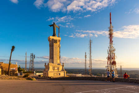 Es Mercadal, Menorca - October 15, 2019: The Christ Monument on the top of El Toro Mountain - the highest peak of Menorca, Balearic Islands, Spainのeditorial素材