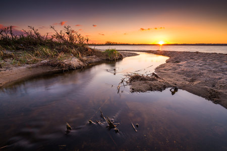 Baltic sea beach during sunset in Rewa. Baltic Sea. Poland