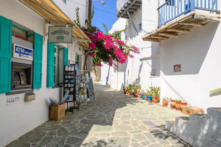 Folegandros, Greece - September 23, 2020: Street with shops and flowers in Chora, the capital of the island of Folegandrosのeditorial素材