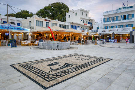 Ios, Greece - September 19, 2020: Main square with restaurants and taverns in the port of Ios island. Cyclades, Greeceのeditorial素材