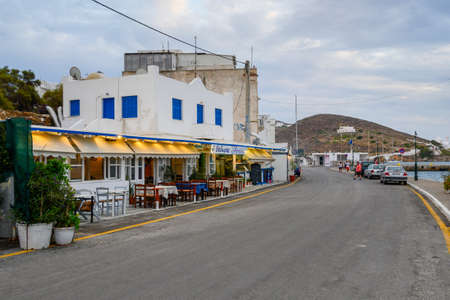 Ios, Greece - September 19, 2020: View of street with restaurants and shops in the port of Ios island. Cyclades, Greeceのeditorial素材