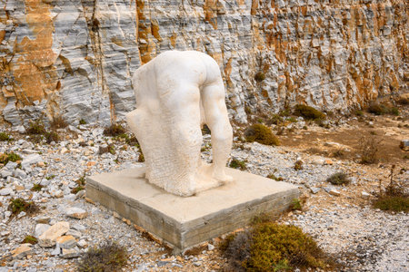 Ios, Greece - September 20, 2020: Contemporary Greek art, a marble sculpture standing by the road on the north side of Ios Island. Cyclades, Greeceのeditorial素材