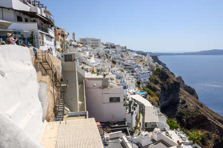 Santorini Greece, September 17, 2020: Traditional Cycladic architecture in Fira, Santorini. Cyclades Islands, Greeceのeditorial素材