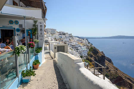 Waterfront promenade in Fira, a largest town in Santorini, with great caldera views and lots of restuarants. Cyclades Islands, Greeceのeditorial素材