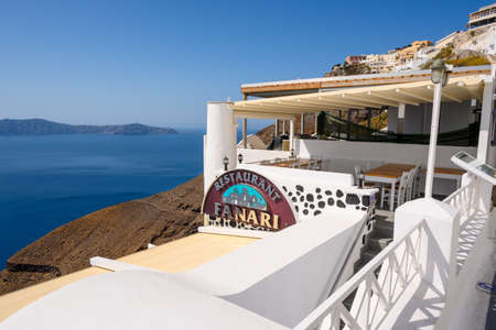 Santorini Greece, September 17, 2020: Greek seafront restaurant in Fira on Santorini Island. Cyclades, Greeceのeditorial素材