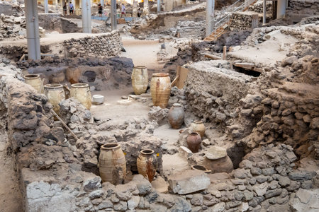Santorini, Greece - September 18, 2020: Recovered ancient pottery in prehistoric town of Akrotiri, one of the most important prehistoric settlements of the Aegean. An archaeological site of Akrotiri in Santorini, Greeceのeditorial素材