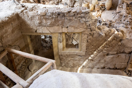 Santorini, Greece - September 18, 2020: Recovered ancient buildings in prehistoric town of Akrotiri, one of the most important prehistoric settlements of the Aegean. An archaeological site of Akrotiri in Santorini, Greeceのeditorial素材