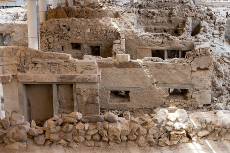 Santorini, Greece - September 18, 2020: Recovered ancient buildings in prehistoric town of Akrotiri, one of the most important prehistoric settlements of the Aegean. An archaeological site of Akrotiri in Santorini, Greeceのeditorial素材