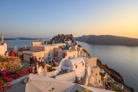 Santorini, Greece - September 17, 2020: Famous tourist attraction, Oia village in Santorini during sunset.のeditorial素材