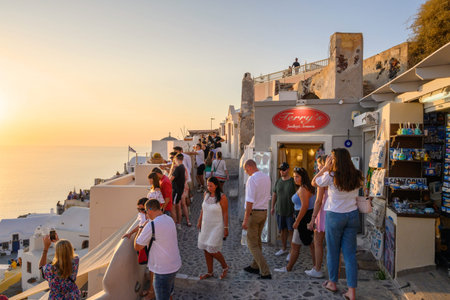 Santorini, Greece - September 17, 2020: Famous tourist attraction, Oia village in Santorini during sunset.のeditorial素材