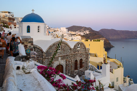 Santorini, Greece - September 17, 2020: Greek architecture of Oia village on Santorini island, Cyclades, Greeceのeditorial素材