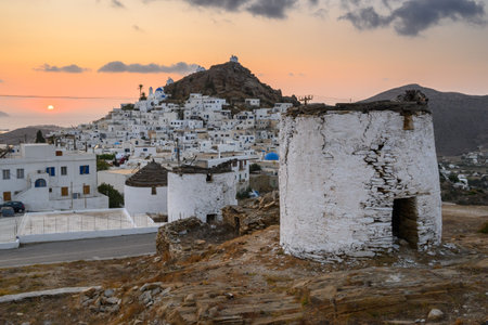 The traditional Greek windmills of Ios Island in beautiful Cycladic town of Chora. Greeceの写真素材