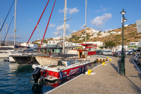 Ios, Greece - September 21, 2020: Boats moored in main port of the island of Ios. Cyclades Islands, Greeceのeditorial素材