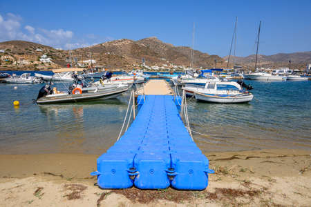 Ios, Greece - September 22, 2020: Boat dock gangway in marina of Ios Island. Cyclades Islands, Greeceのeditorial素材
