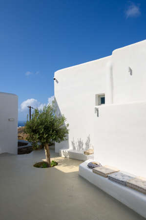 Ios, Greece - September 22, 2020: A whitewashed summer villa in the Cyclades style on Ios. Greeceのeditorial素材