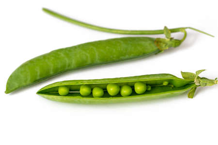 Fresh green peas on a white backgroundの写真素材