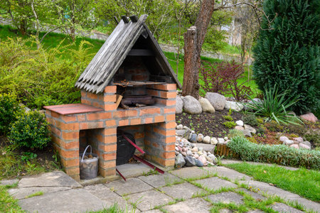 Barbeque brick grill fireplace in the gardenの写真素材