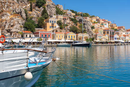 Sea bay with colorful Greek architecture on Symi island. Greeceの写真素材