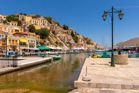 SYMI, GREECE - May 15, 2018: The island of Symi with its historic colorful buildingsのeditorial素材