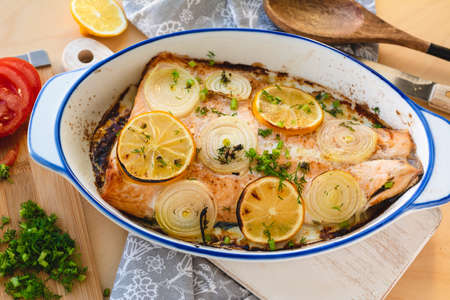 Salmon fillet baked with vegetables. Fish dishの写真素材