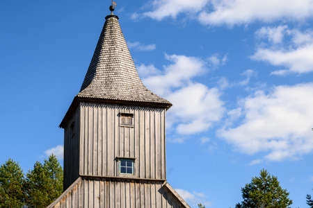 Wdzydze Kiszewskie, Poland - May 15, 2022: Tower of wooden church in Kashubian Ethnographic Park in Wdzydze Kiszewskieのeditorial素材