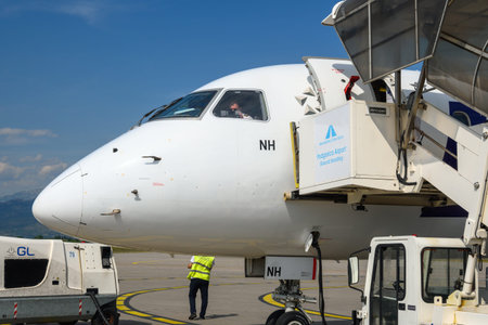Podgorica, Montenegro - June 3, 2022: Passenger plane of Polish airlines LOT at the airport in...