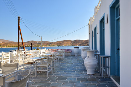Typical seaside restaurant with beautiful sea view in Livadi village on Serifos Island. Greeceの写真素材