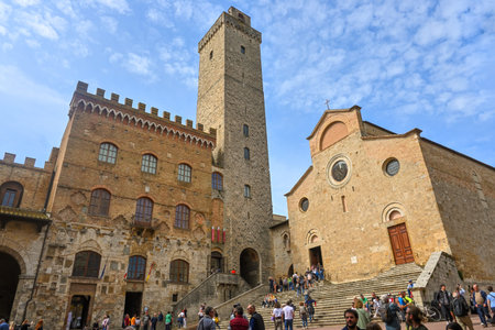 San Gimignano, Italy - April 30, 2023: The Collegiate Church of Santa Maria Assunta, iconic basilica and major landmark in the historic center of San Gimignano, Italyのeditorial素材