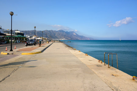 Kos, Greece - May 12, 2023: Coastal promenade along sea in Kardamena resort. Kos island, Greeceのeditorial素材
