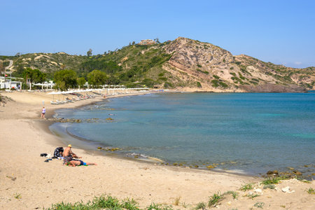 Kos, Greece - May 12, 2024: Agios Stefanos beach with fine sand on the island of Kos. Greeceのeditorial素材