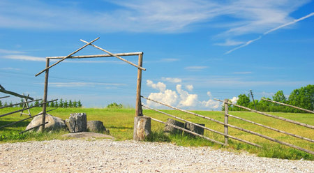 landscape with an old gates and dark blue skyの写真素材