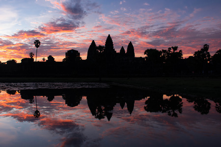 The silhouette of Angkor Wat the largest temple in the world before sunrise in Siem Reap, Cambodia.の写真素材