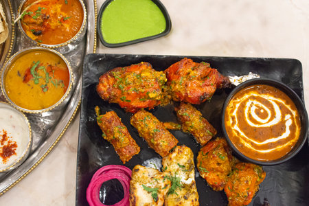 Indian food made in Thailand There will be meat such as fish, shrimp, chicken, goat and curry served together.の写真素材