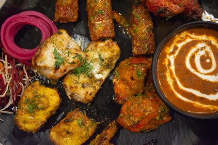 Indian food made in Thailand There will be meat such as fish, shrimp, chicken, goat and curry served together.の写真素材