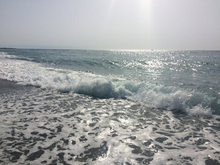 beautiful sea waves in the morning on the shore of the beachの写真素材