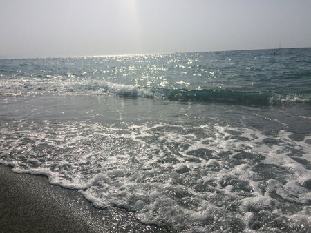 beautiful sea waves in the morning on the shore of the beachの写真素材
