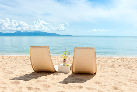 Chairs on  the beach near with sea