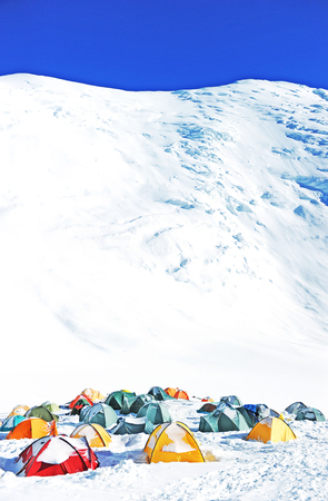 Tents on the glacier in high mountainsの写真素材