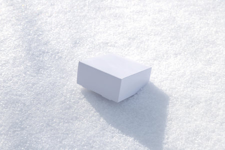 craft white square boxes on snow. High quality photoの写真素材