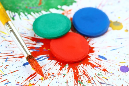 Watercolors with brushes on an abstract background の写真素材