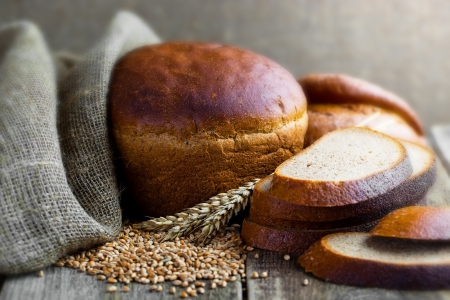 Bread rye spikelets on an old backgroundの写真素材