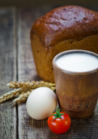 Bread with a mug of milkの写真素材