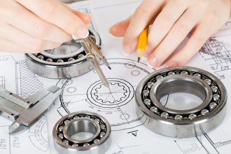 tools and mechanisms detail on the background of technical drawingsの写真素材