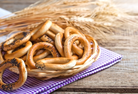 fresh bread and wheat on the woodenの写真素材