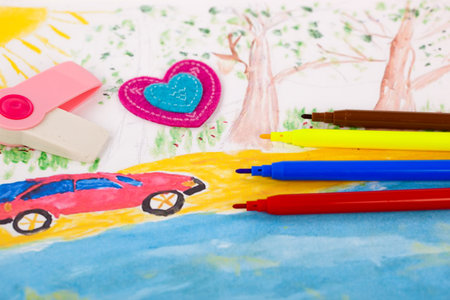 Back to school blackboard with pencilbox and school equipment on tableの写真素材