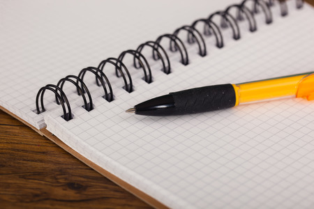 Back to school blackboard with pencilbox and school equipment on tableの写真素材