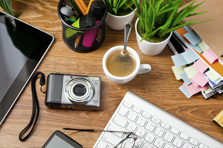 Business Objects office expanded in composition on a tableの写真素材