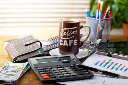 Business Objects office expanded in composition on a tableの写真素材