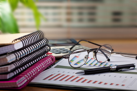 Business Objects office expanded in composition on a tableの写真素材